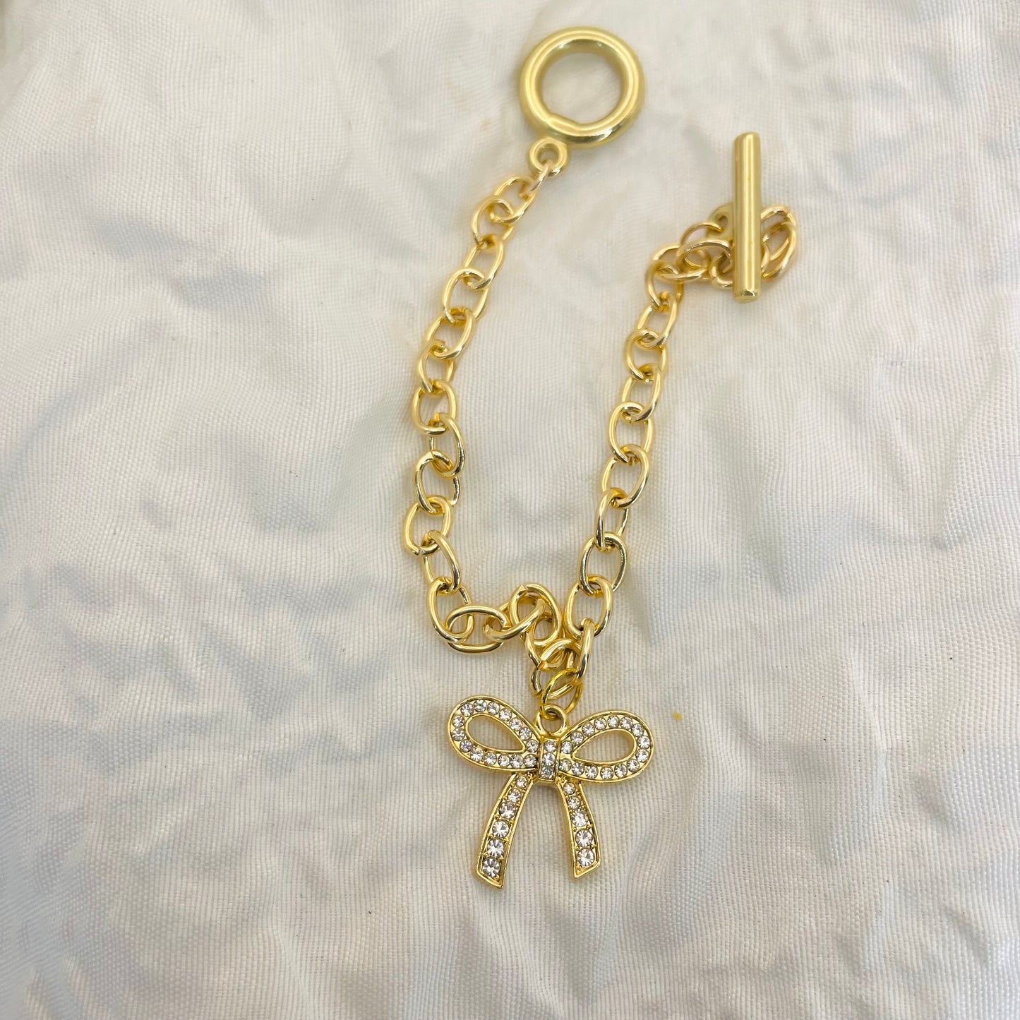 Bow bracelet, gold jewelry