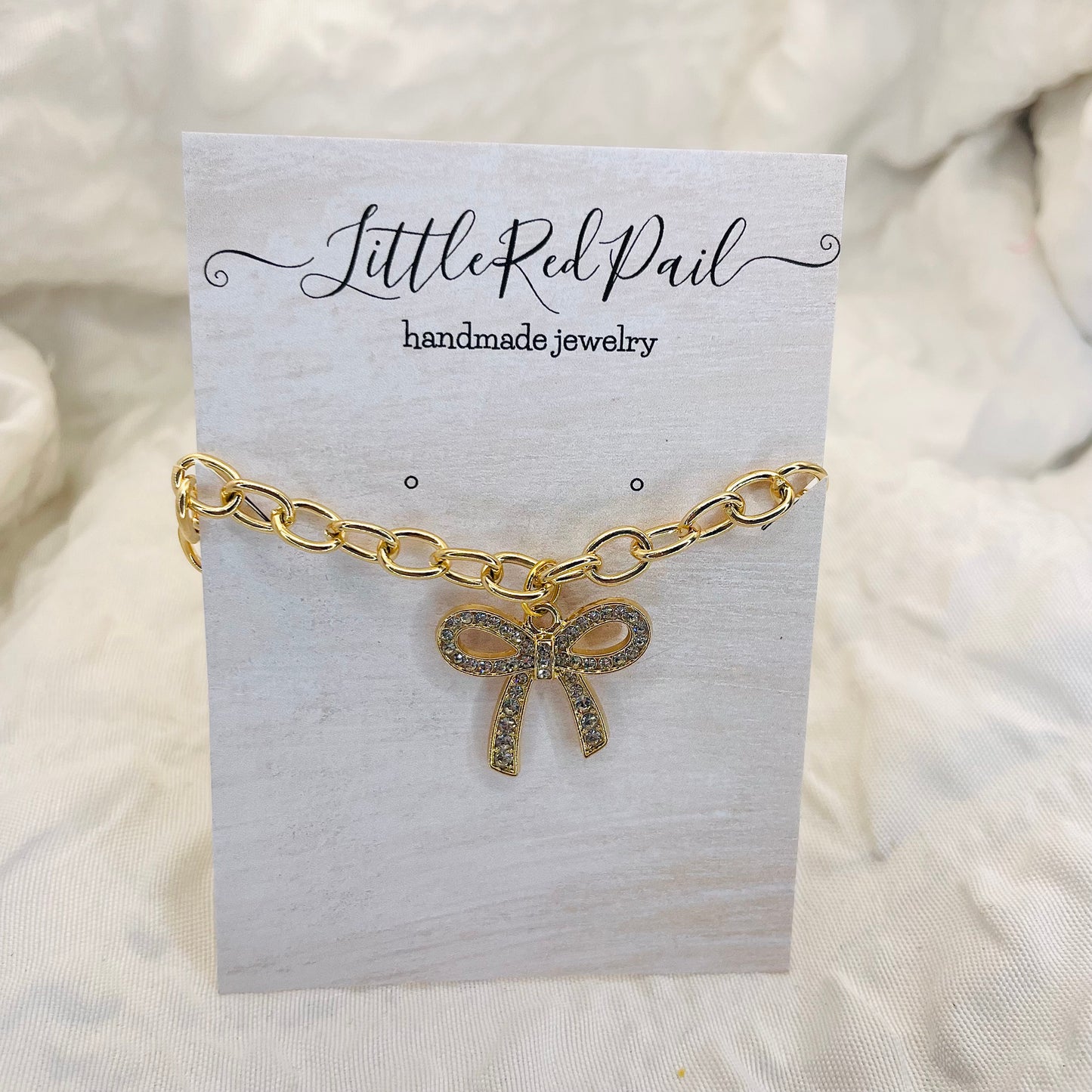 Bow bracelet, gold jewelry