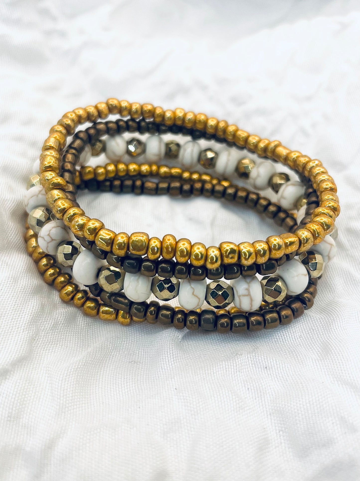 Bracelet stack, bronze and gold bracelets