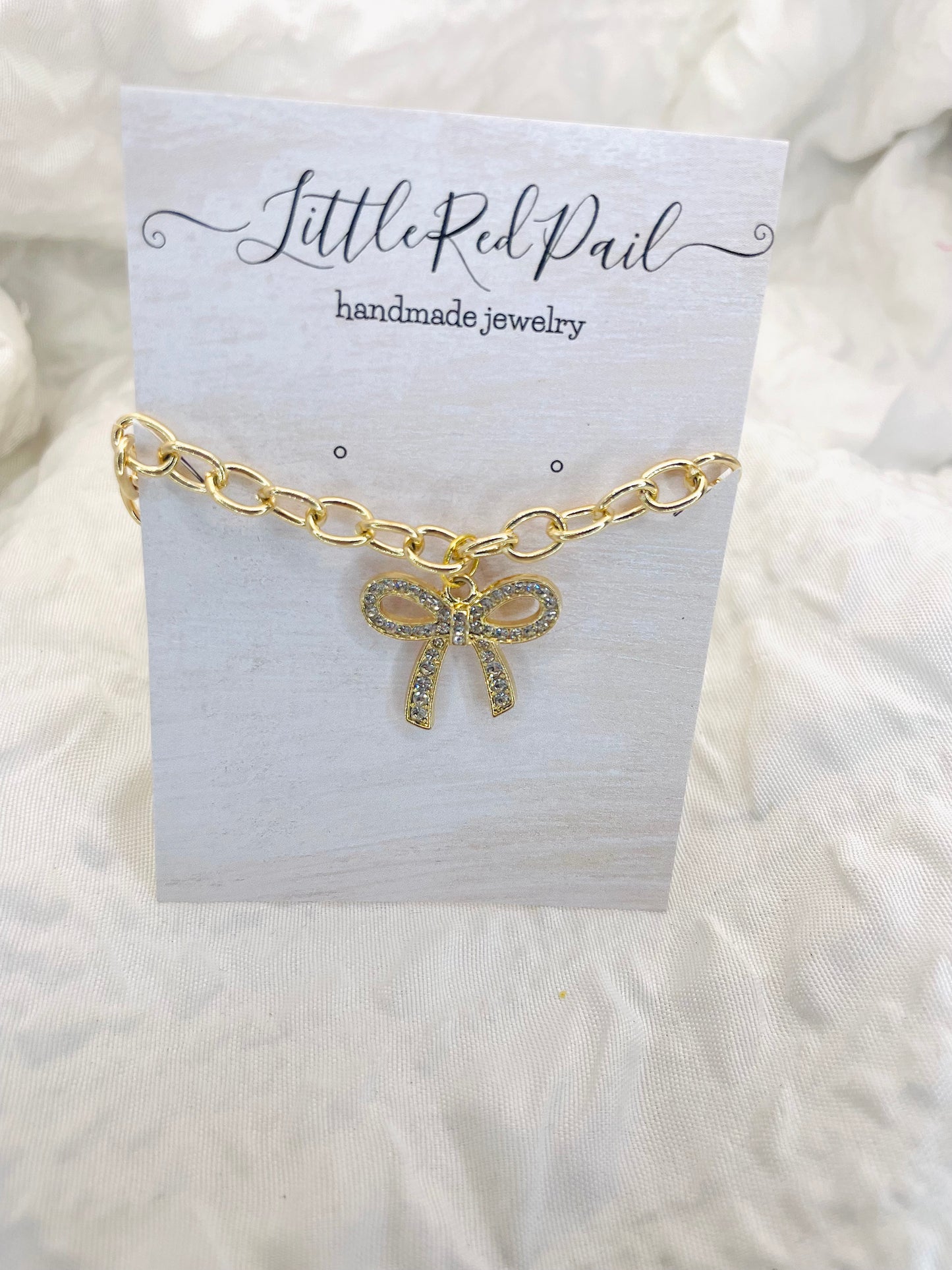 Bow bracelet, gold jewelry