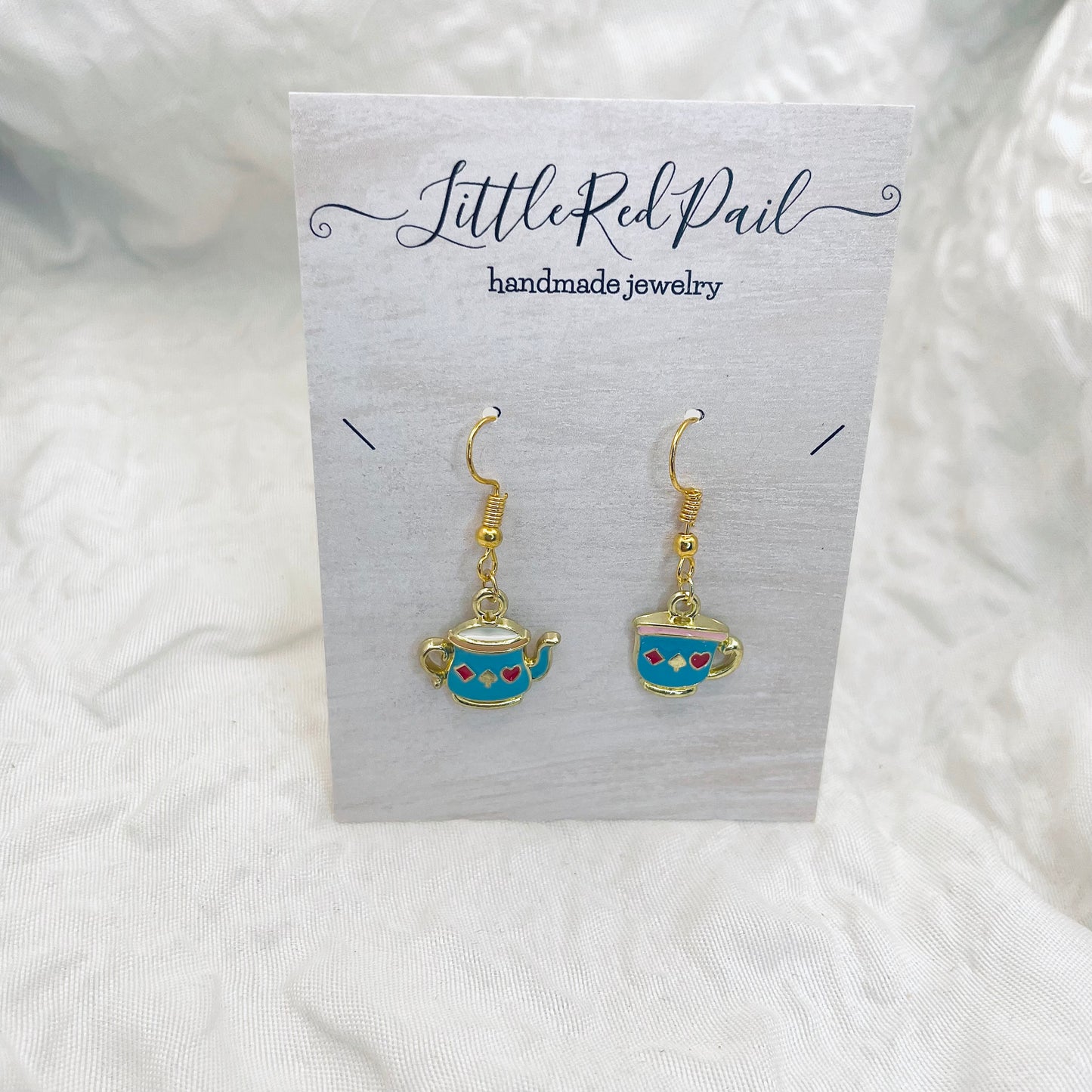 Tea pot or tea cup spill the tea necklace or earrings