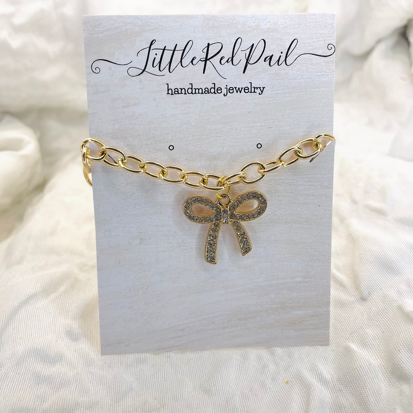 Bow bracelet, gold jewelry