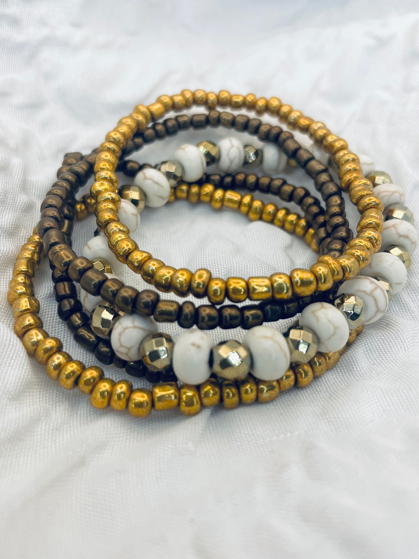 Bracelet stack, bronze and gold bracelets