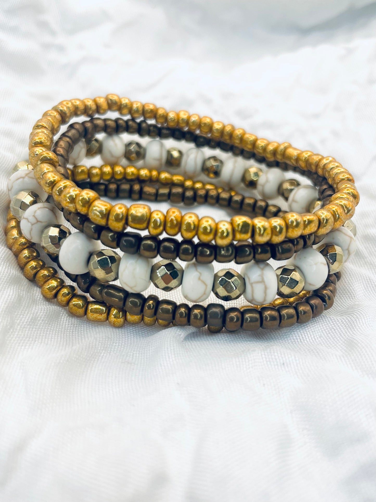 Bracelet stack, bronze and gold bracelets