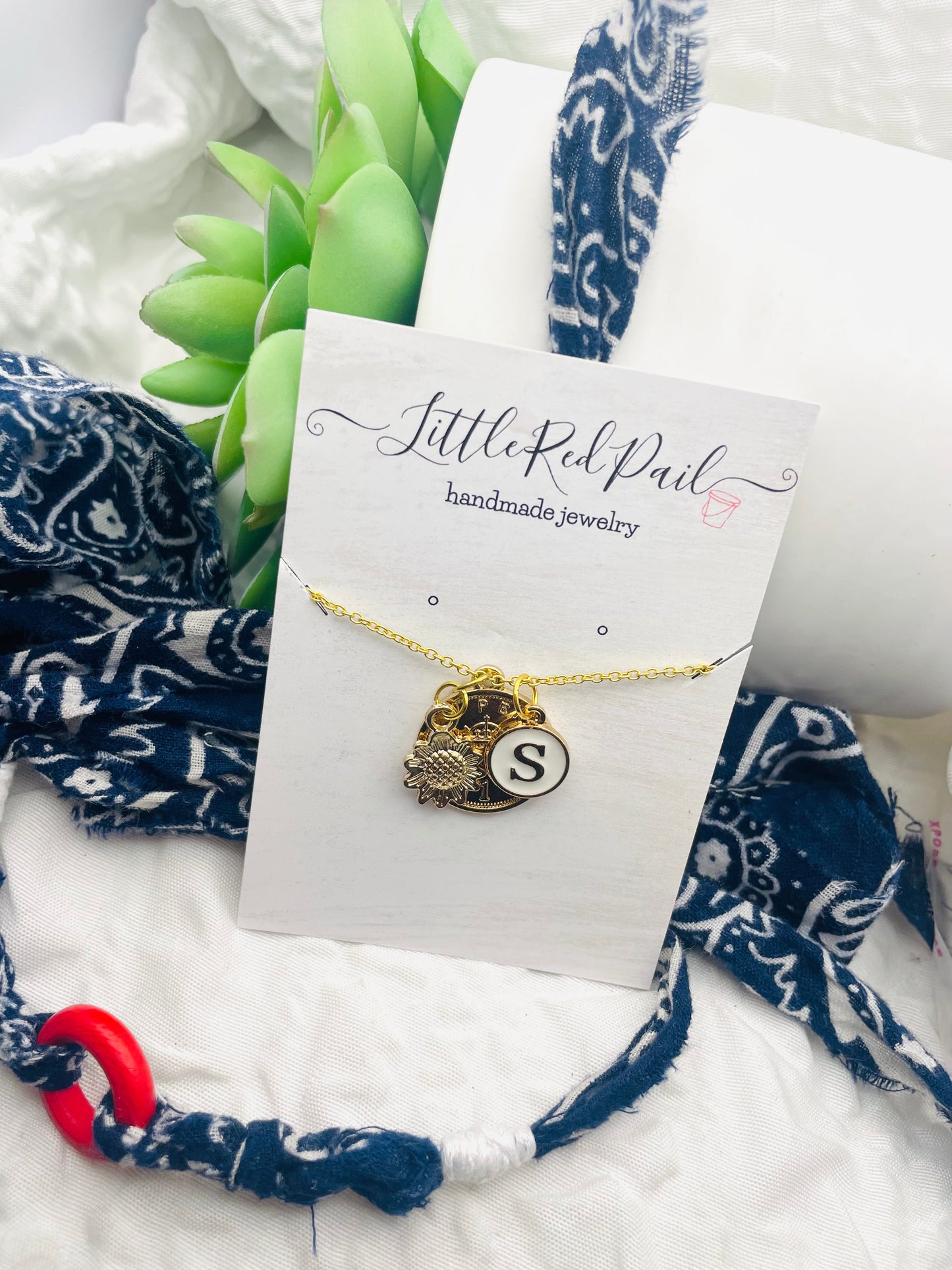Initial gold pendant necklace