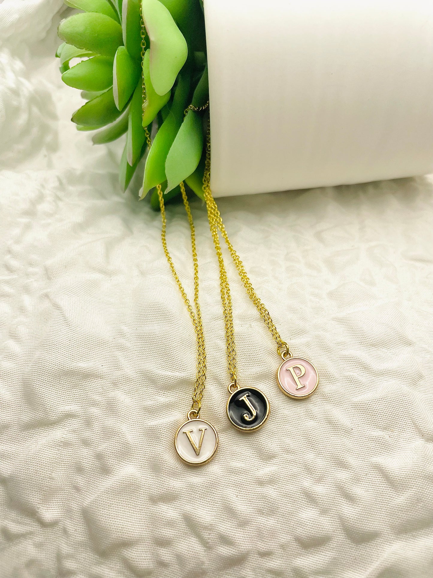 Initial necklaces