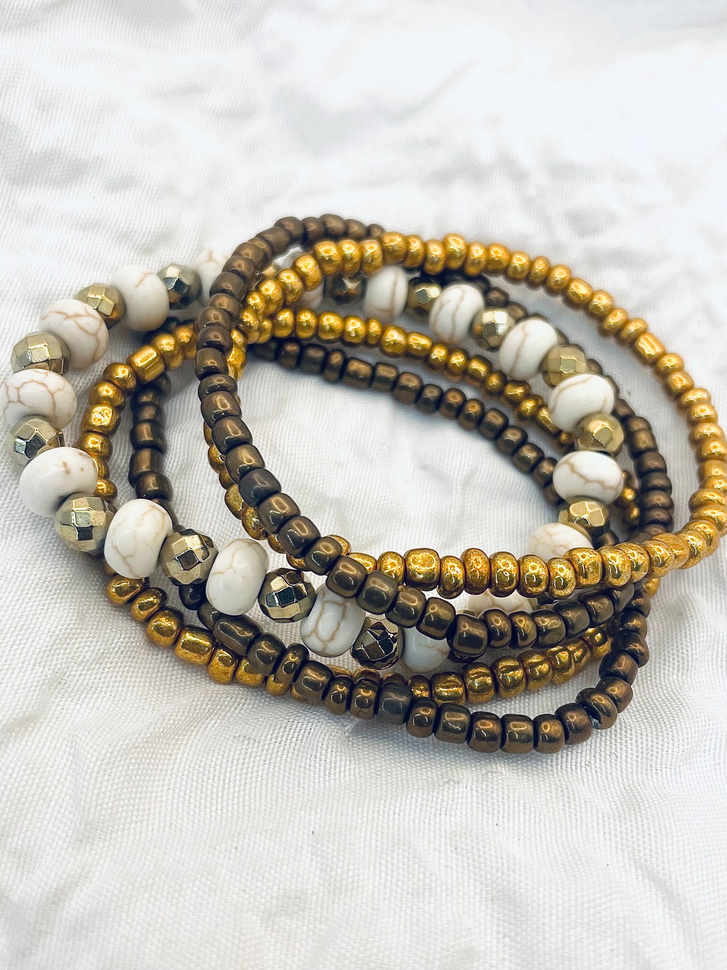 Bracelet stack, bronze and gold bracelets