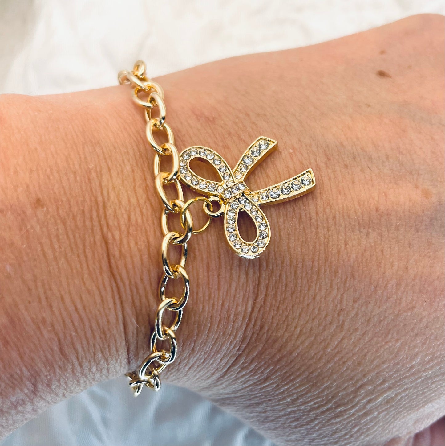 Bow bracelet, gold jewelry