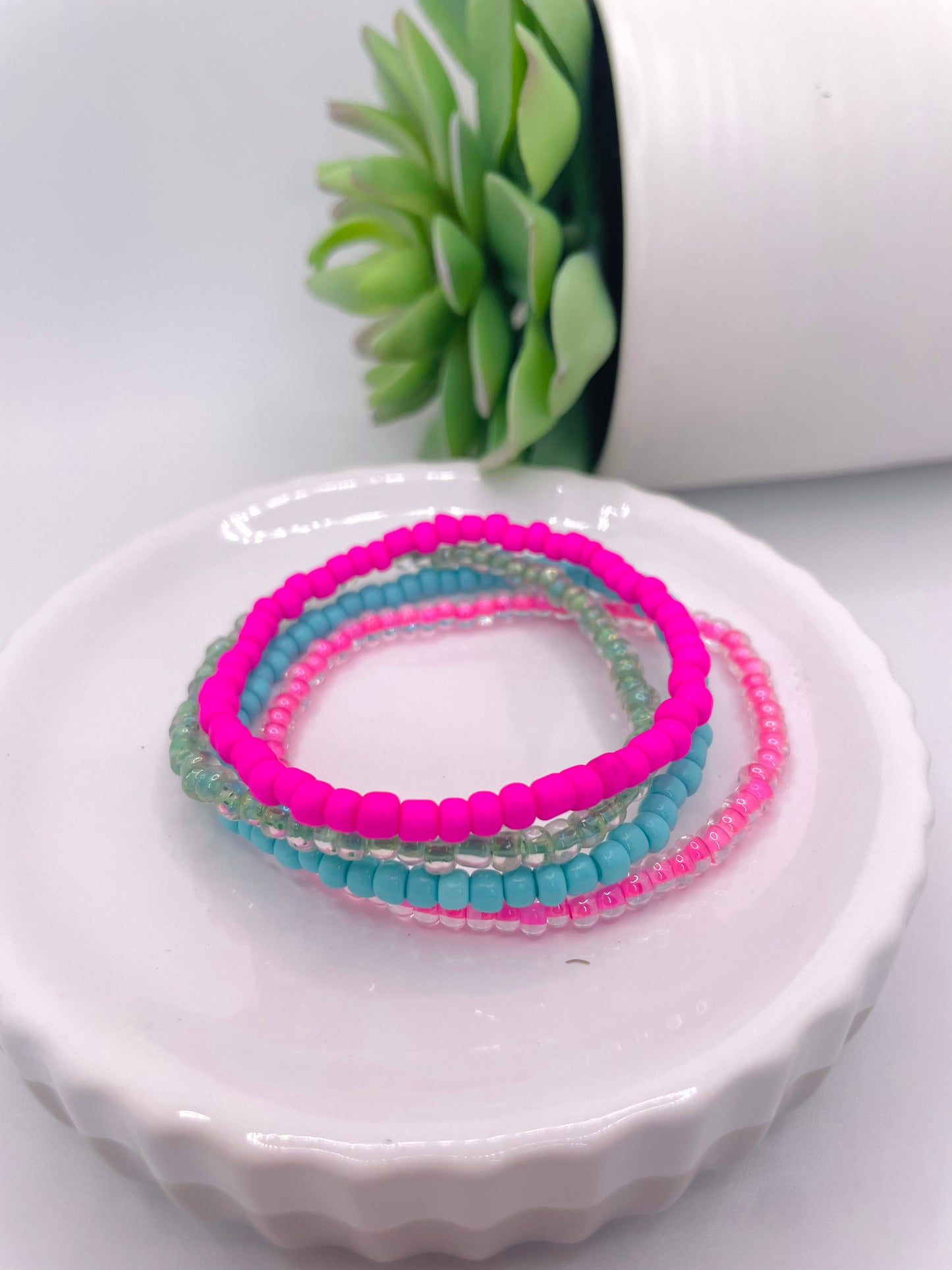 Pink and teal stack bracelet stack