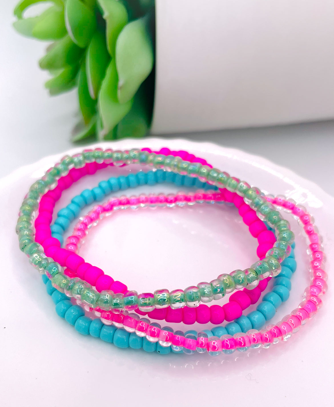 Pink and teal stack bracelet stack