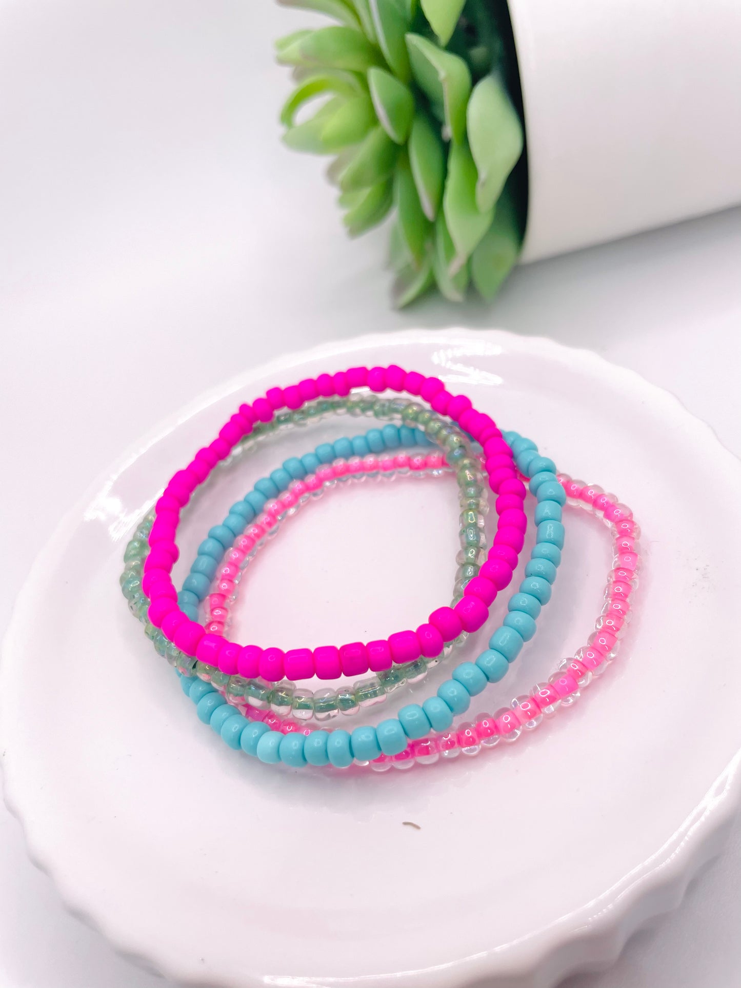 Pink and teal stack bracelet stack