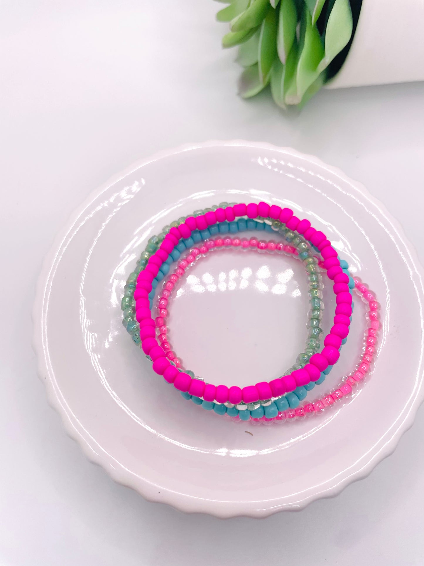 Pink and teal stack bracelet stack