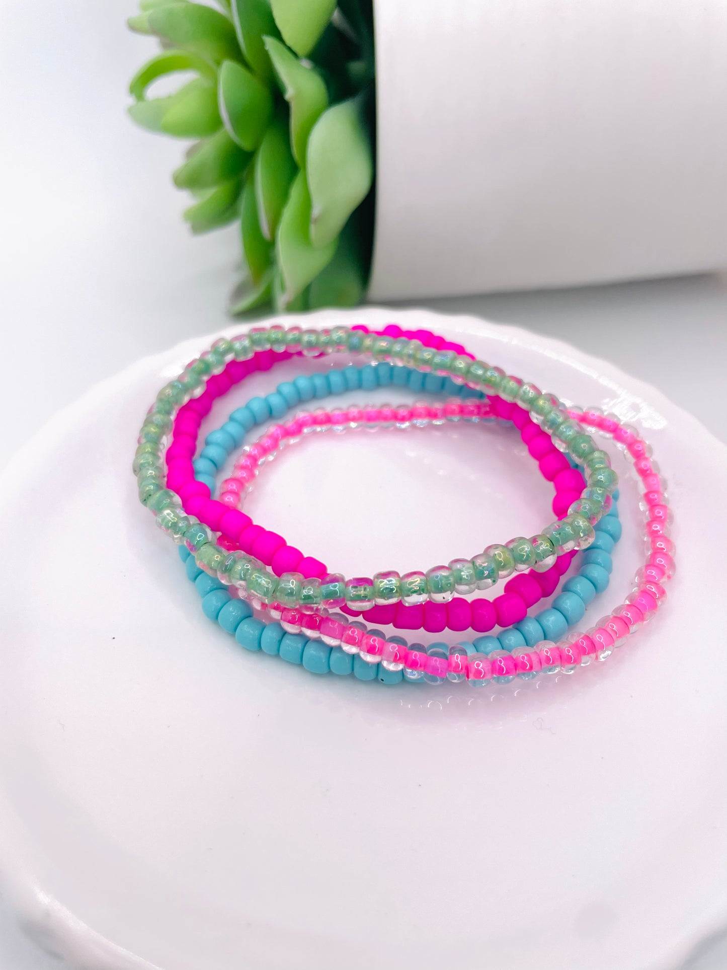 Pink and teal stack bracelet stack