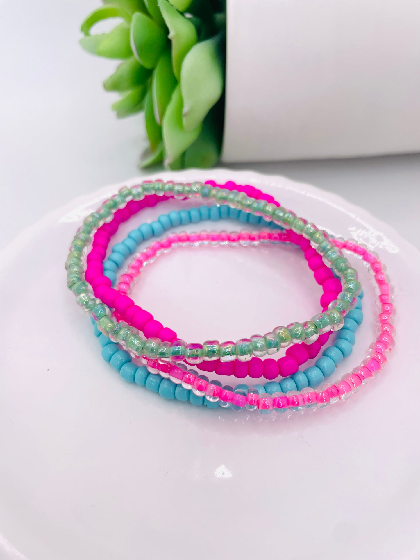 Pink and teal stack bracelet stack