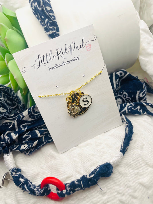 Initial gold pendant necklace