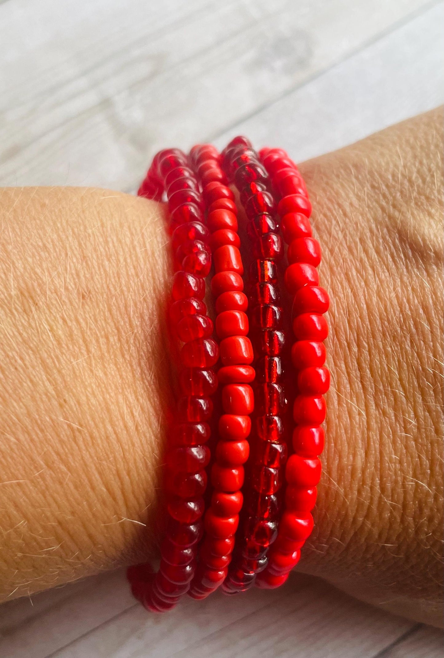 Red bracelets color stack bracelets