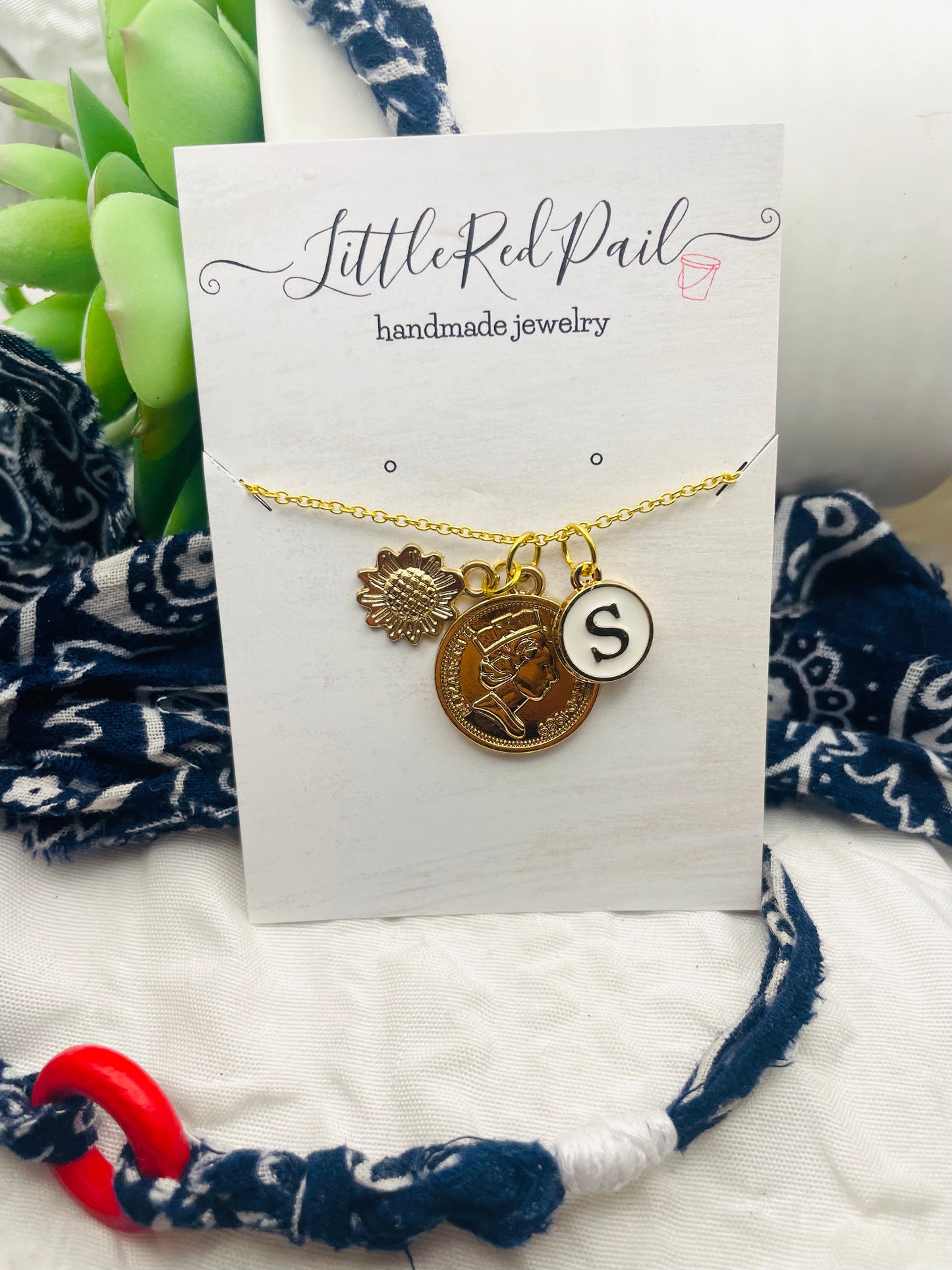 Initial gold pendant necklace