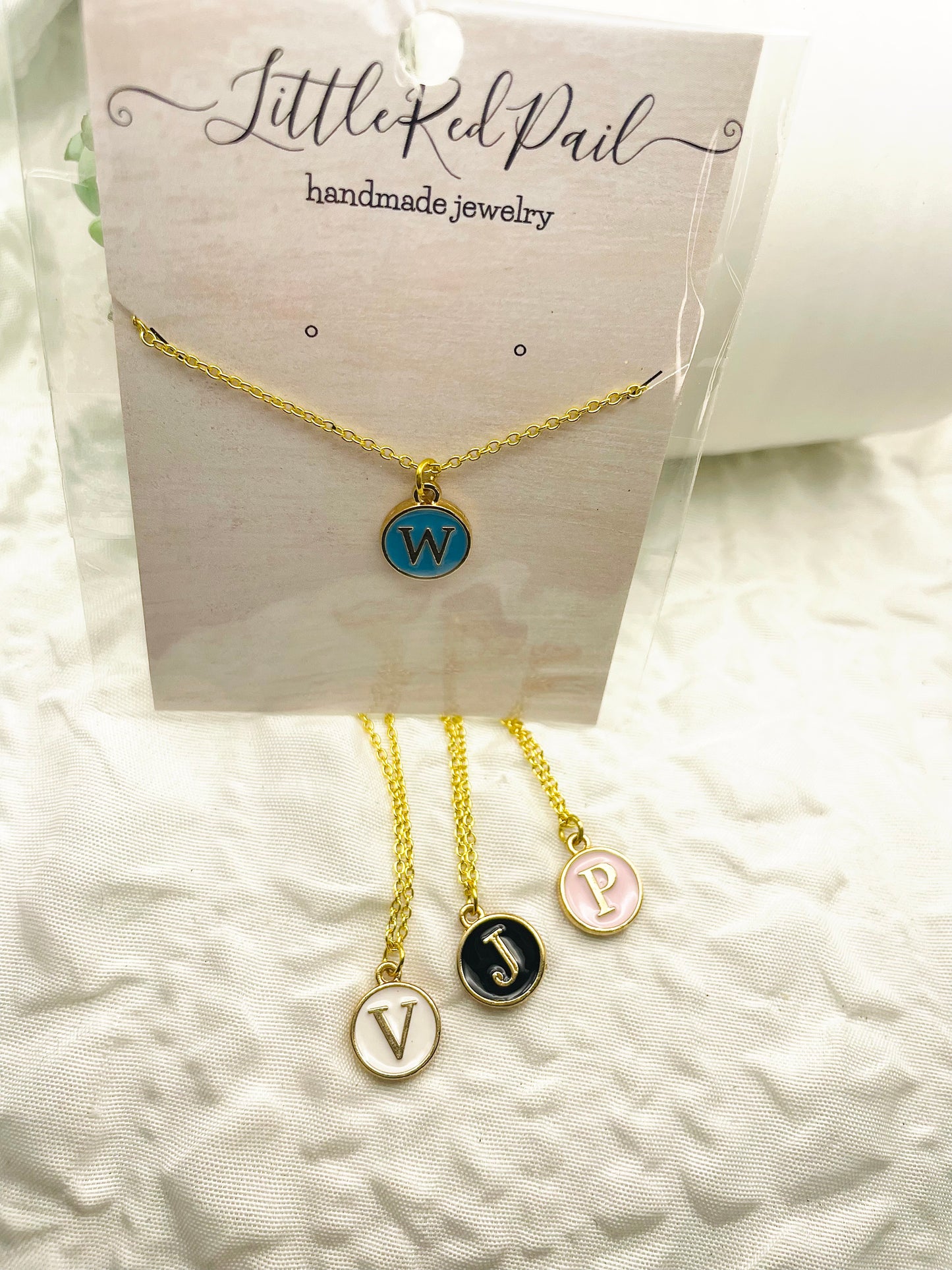 Initial necklaces