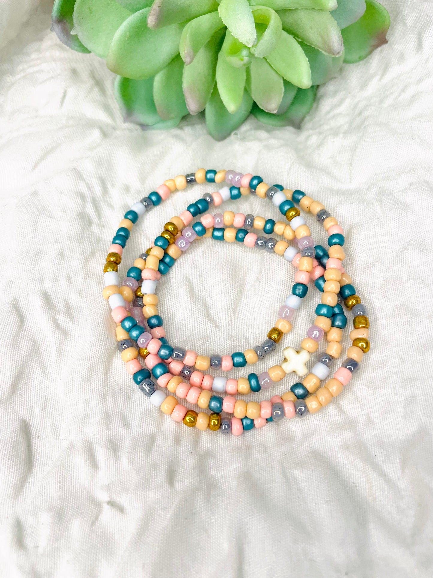Multicolored peach stacked bracelets