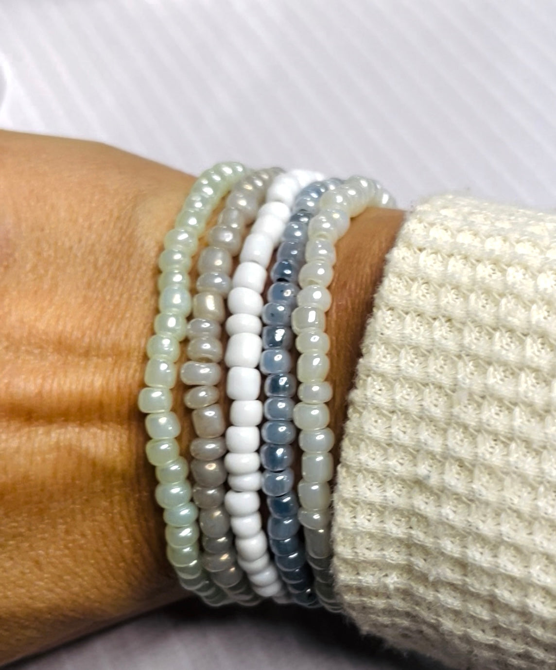 Neutral shade bracelet stack, cloud white shades