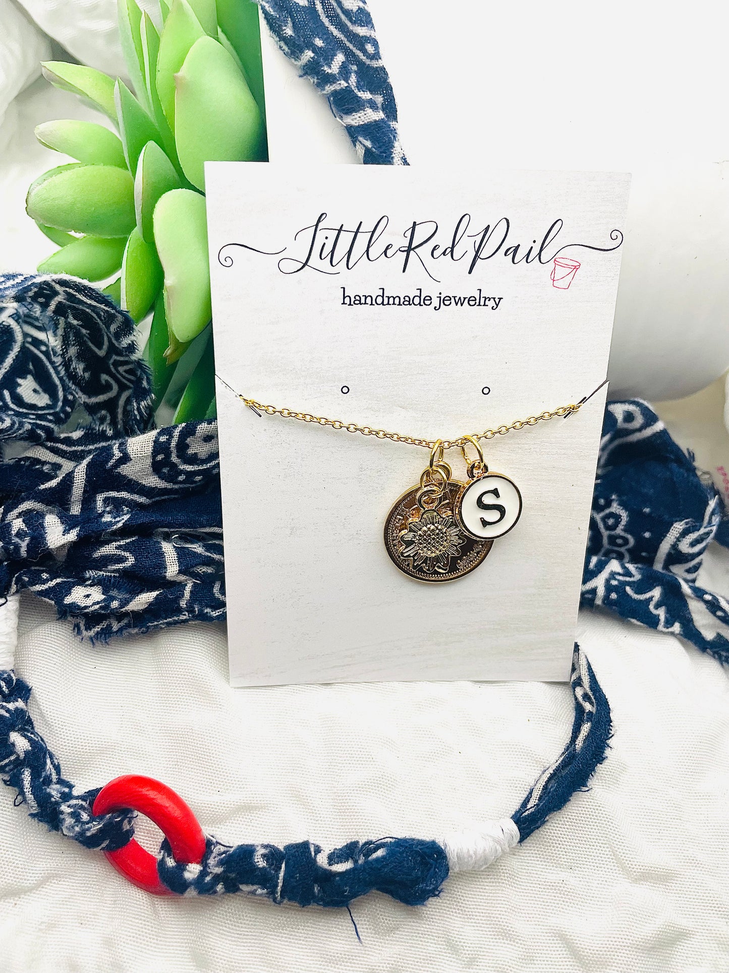 Initial gold pendant necklace