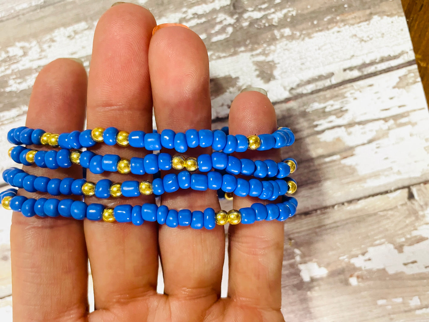 Periwinkle blue and gold bracelets