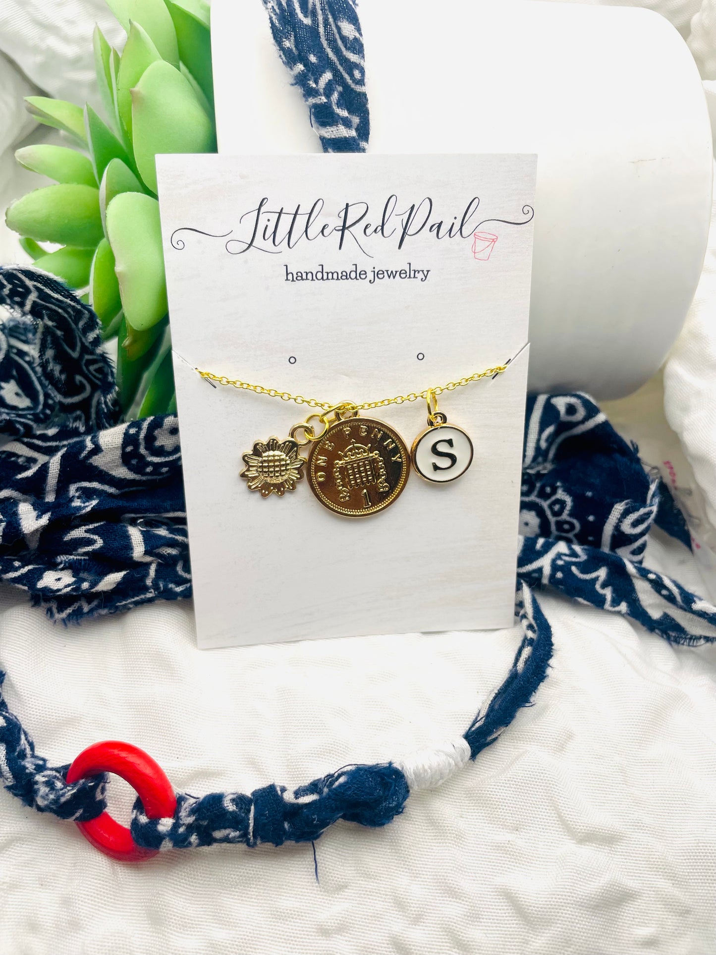 Initial gold pendant necklace
