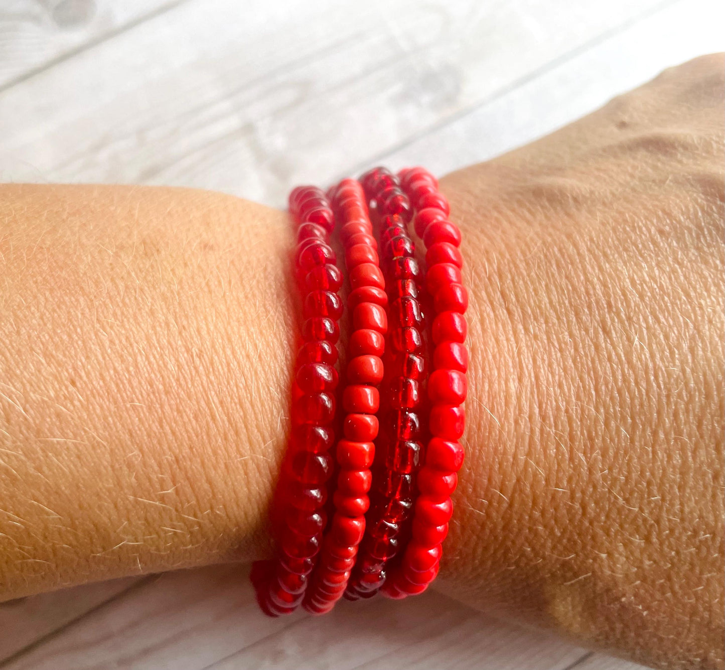 Red bracelets color stack bracelets