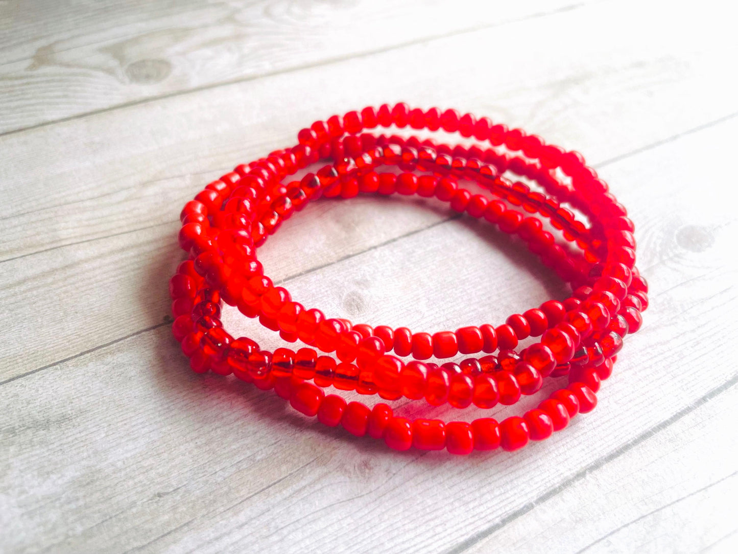 Red bracelets color stack bracelets