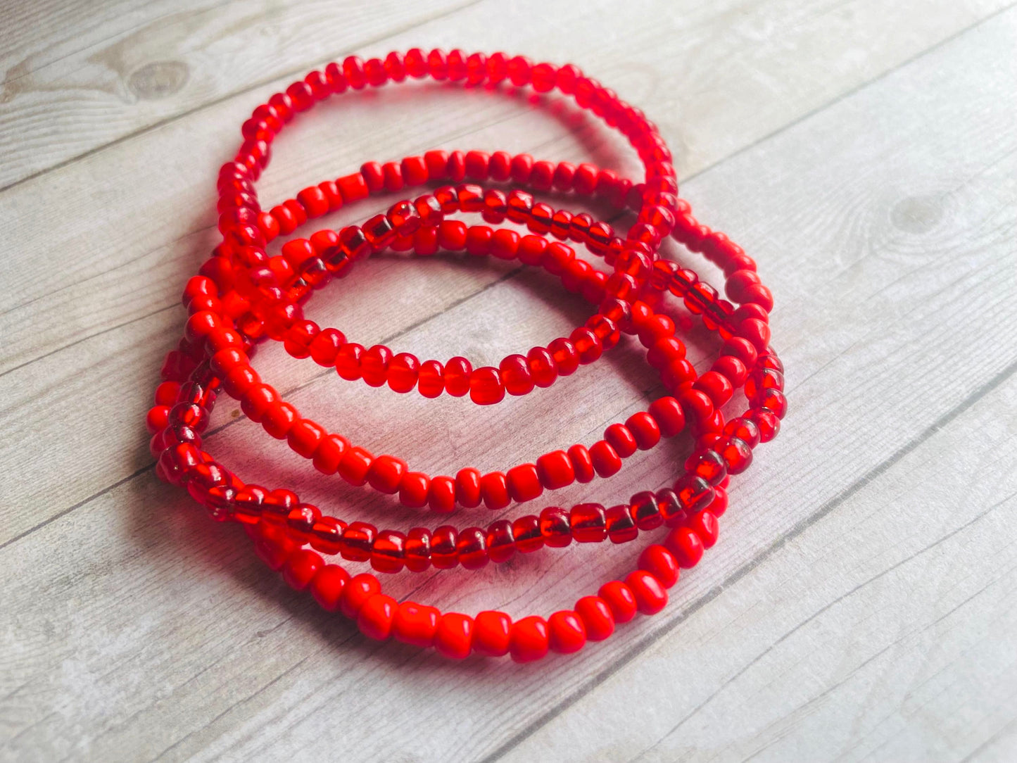 Red bracelets color stack bracelets