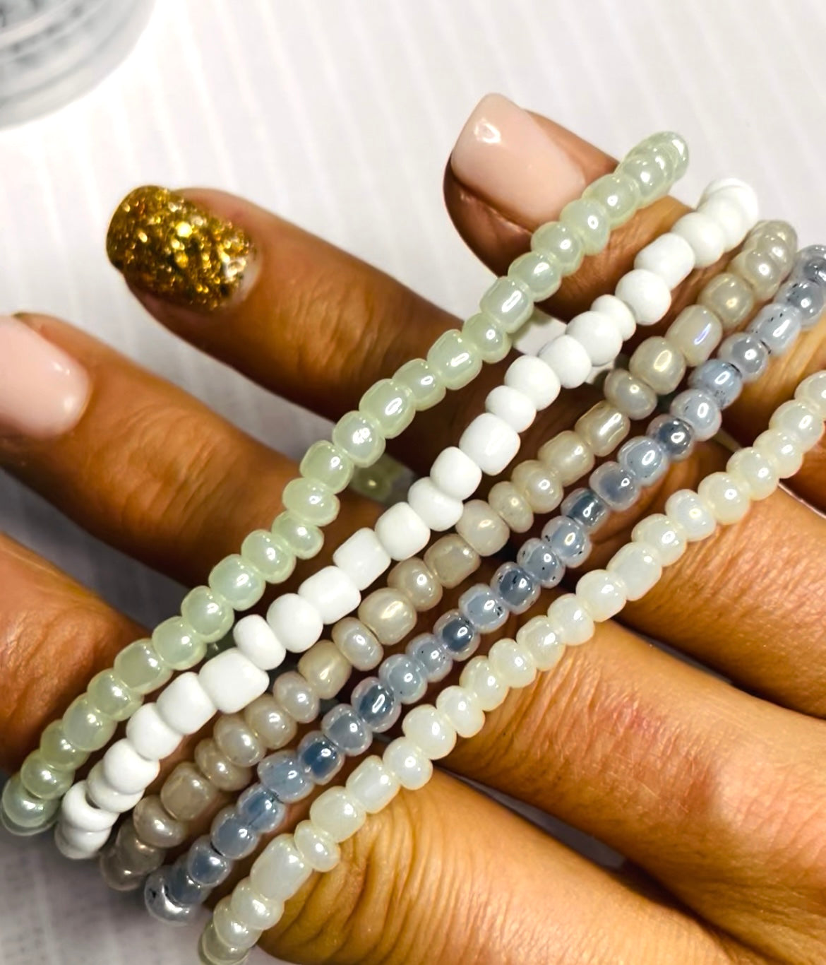 Neutral shade bracelet stack, cloud white shades
