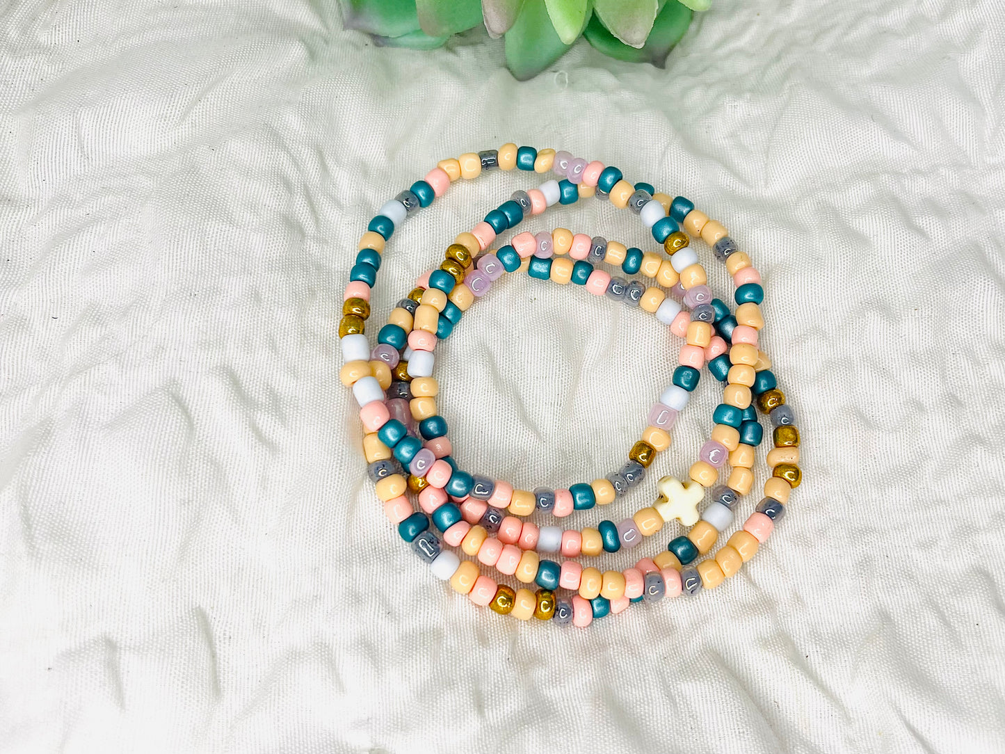 Multicolored peach stacked bracelets