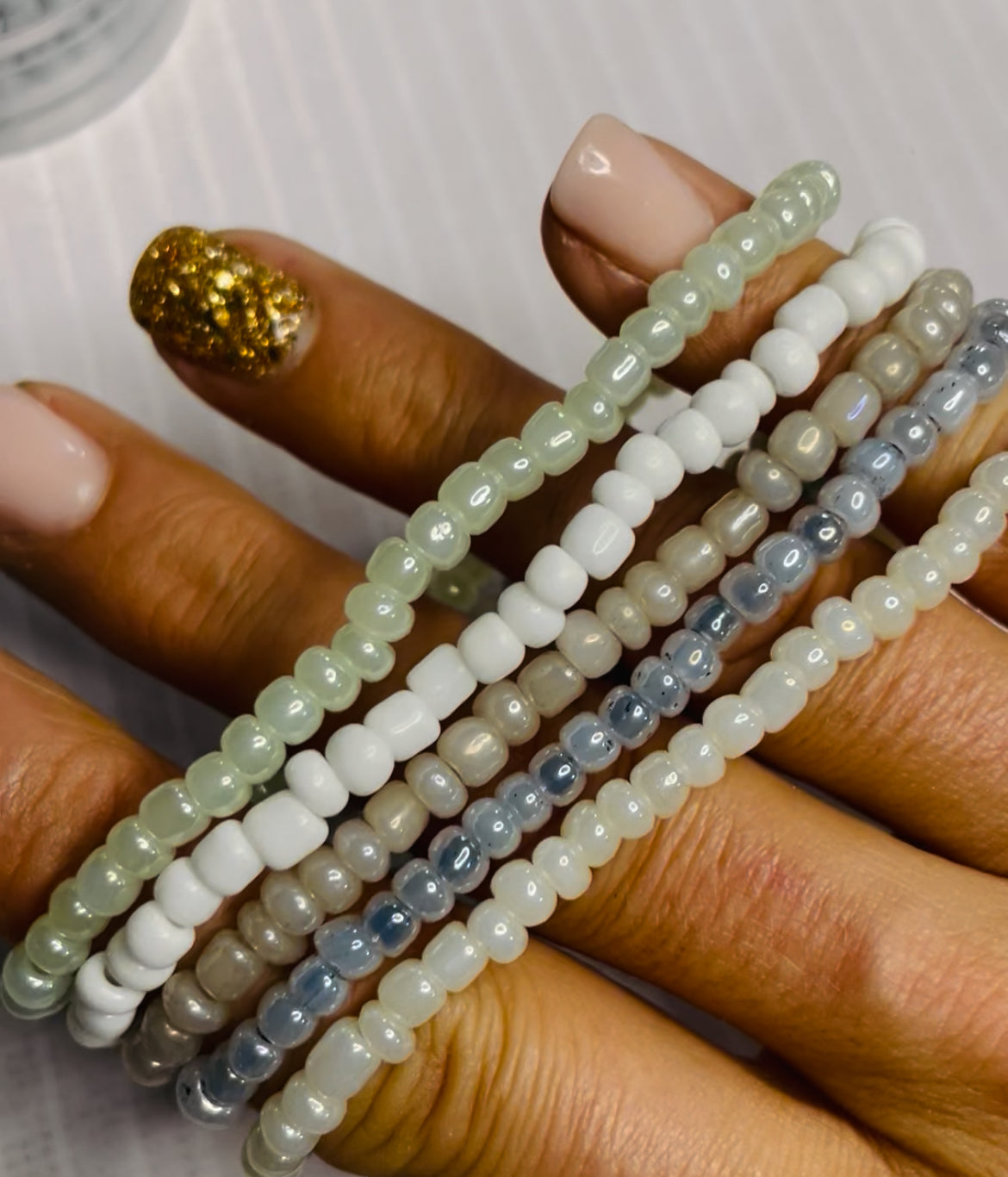 Neutral shade bracelet stack, cloud white shades