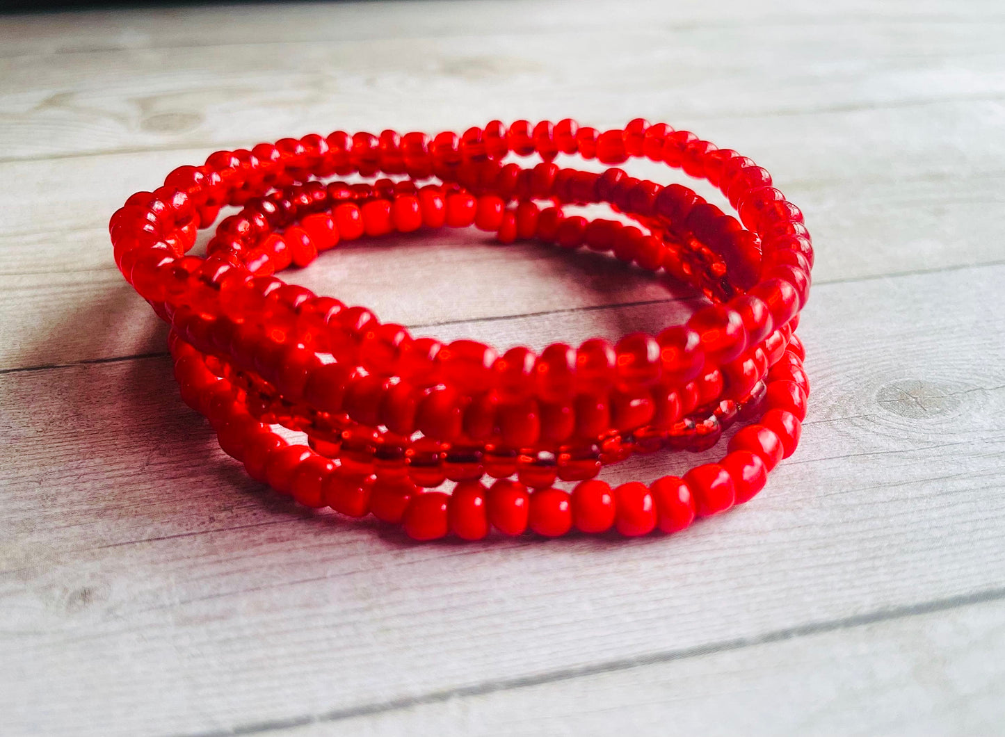 Red bracelets color stack bracelets