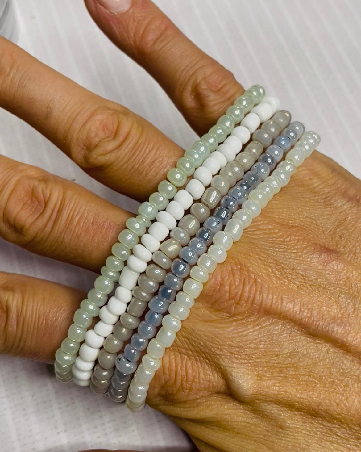 Neutral shade bracelet stack, cloud white shades