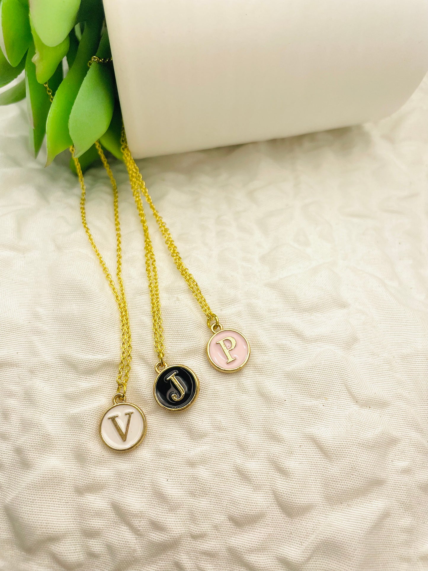 Initial necklaces