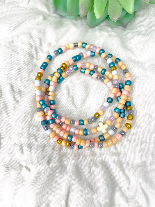 Multicolored peach stacked bracelets