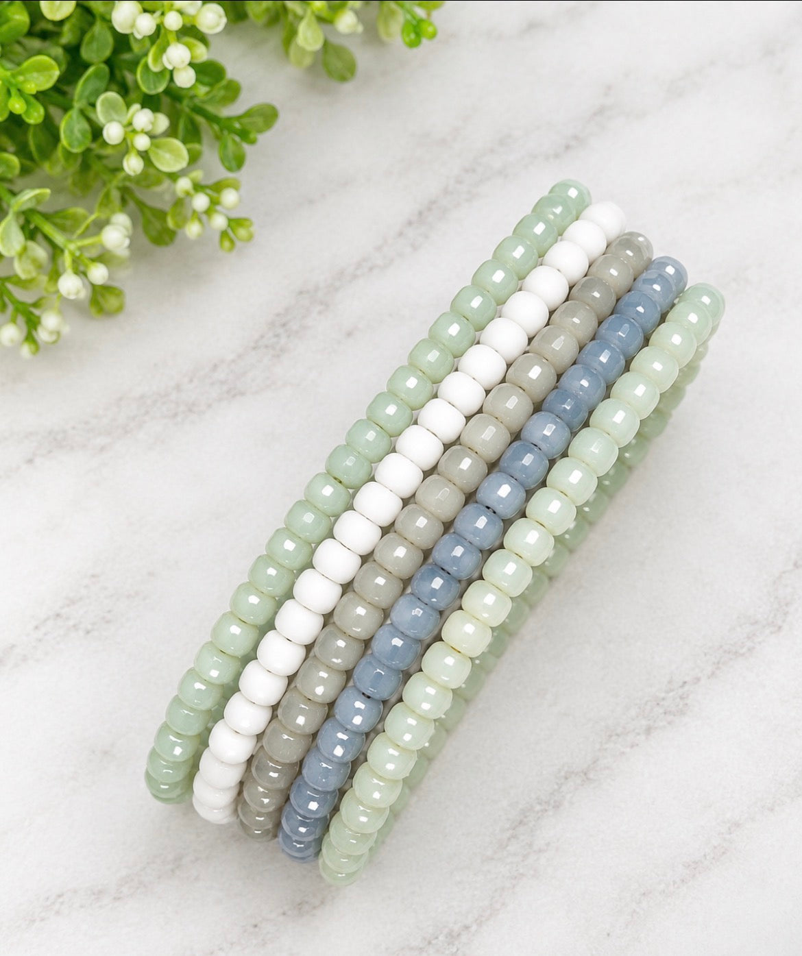 Neutral shade bracelet stack, cloud white shades